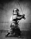 Japan: Samurai in full armour brandishing a katana long sword. Felice Beato, 1860